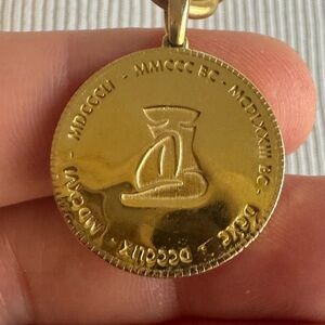 Gold International Women’s Day Pendant with double style chain.